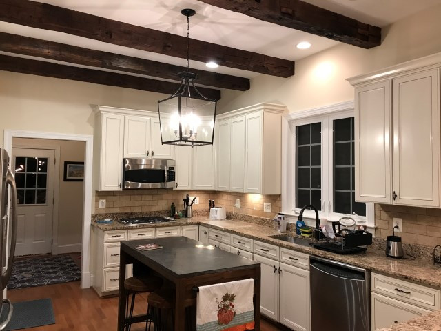adding-rustic-charm-blog-kitchen renovation with dark stained wood ceiling beams