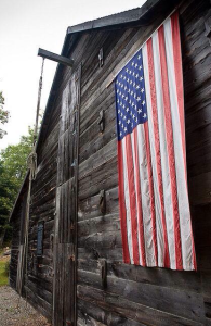 rustic barn with american flag