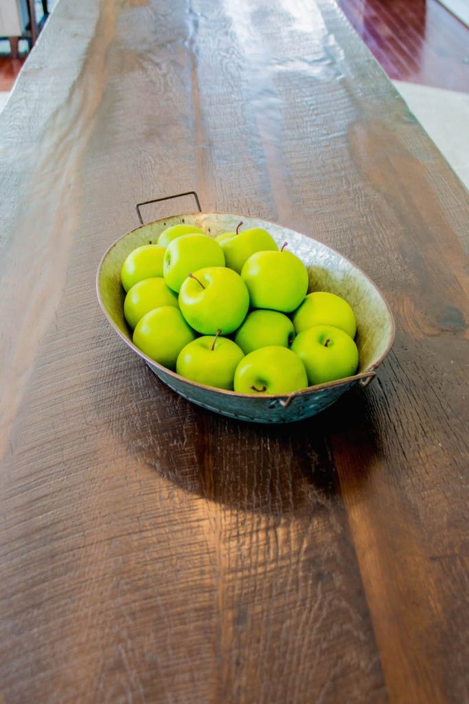 shenandoah-farm-tables-elegant-farmhouse-kitchen-renovation-fruit-bowl-on-reclaimed-wood-countertops