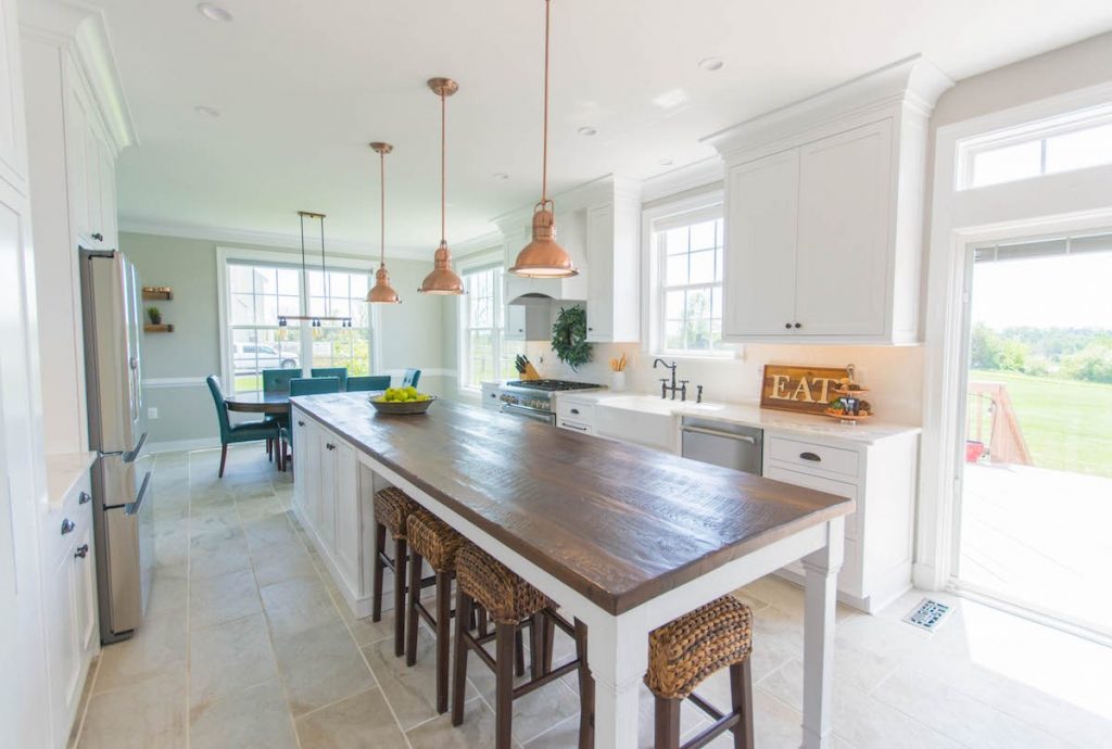 shenandoah-farm-tables-elegant-farmhouse-kitchen-renovation-hanging-kitchen-light-fixtures